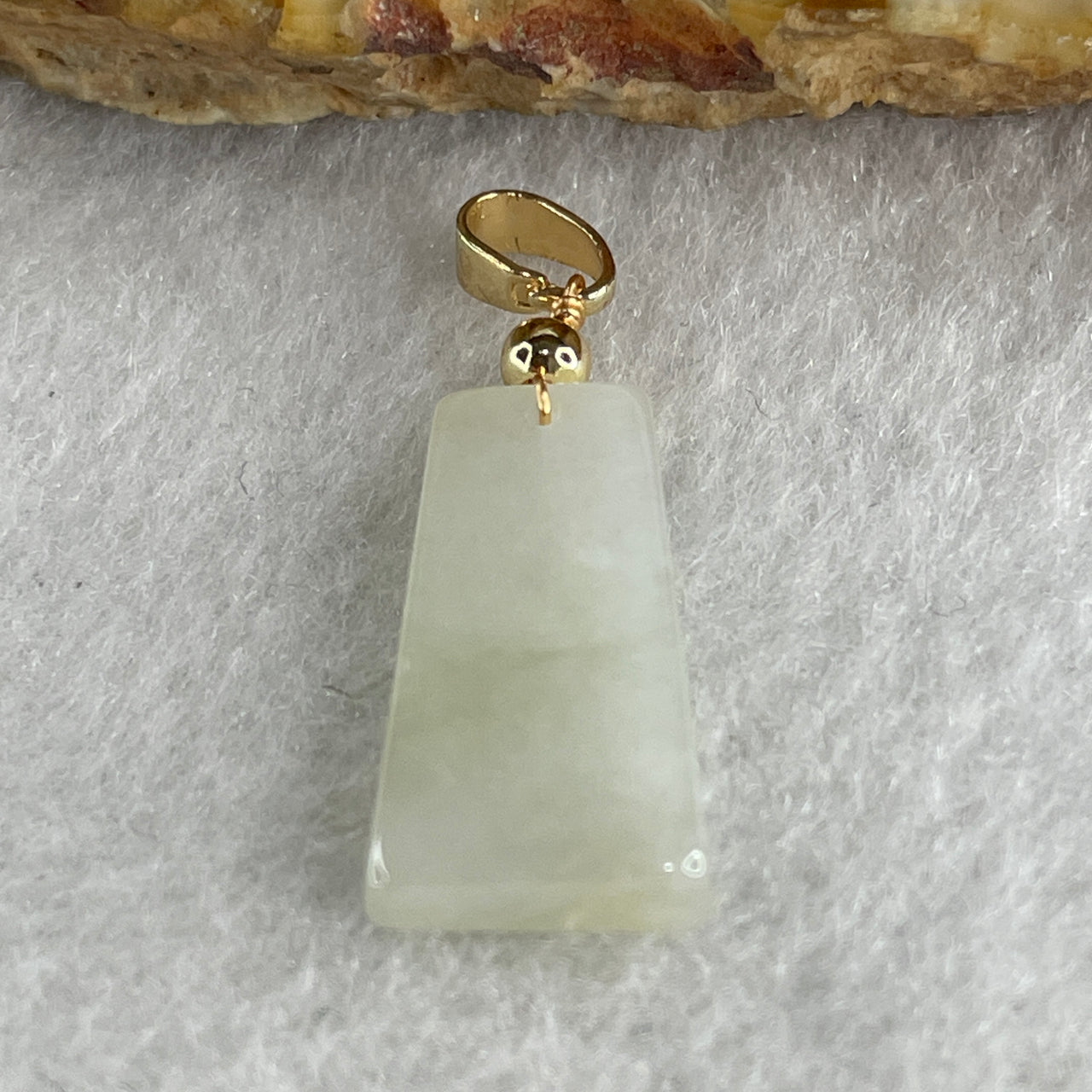 Type A Faint Green Jadeite Wu Shi Pai Pendant 1.81g 18.8 by 10.1 by 3.3mm - Huangs Jadeite and Jewelry Pte Ltd
