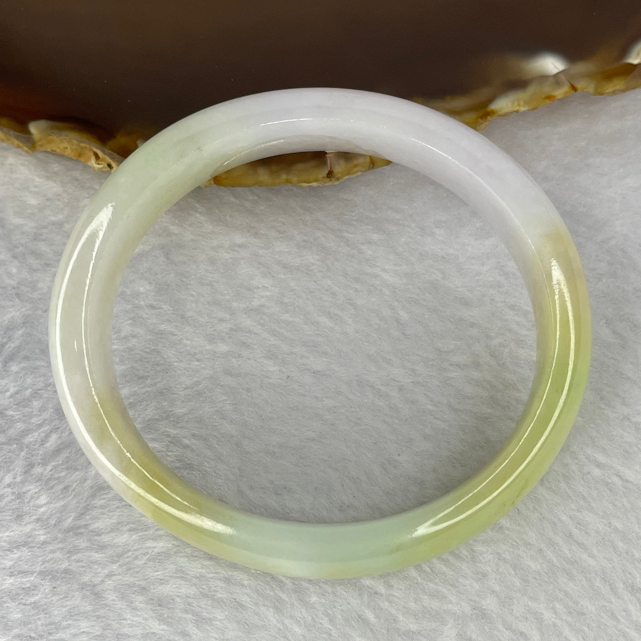 Type A Light Lavender, Green and Yellow Patches Jadeite Bangle 49.41g 14.4 by 7.4 mm Internal Diameter 56.9 mm (slight external rough) - Huangs Jadeite and Jewelry Pte Ltd