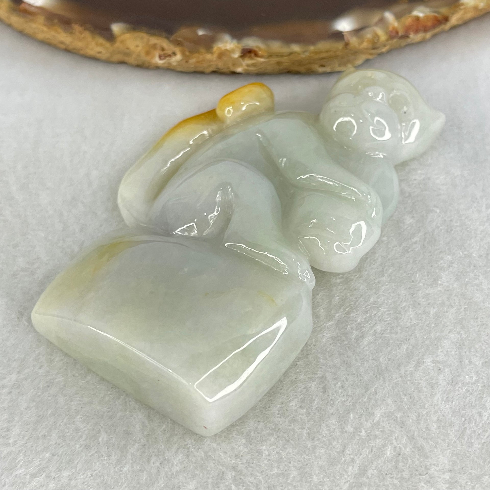 Type A Light Green with Brown Patches Jadeite Monkey Pendant 89.93g 77.0 by 47.9 by 17.1mm - Huangs Jadeite and Jewelry Pte Ltd