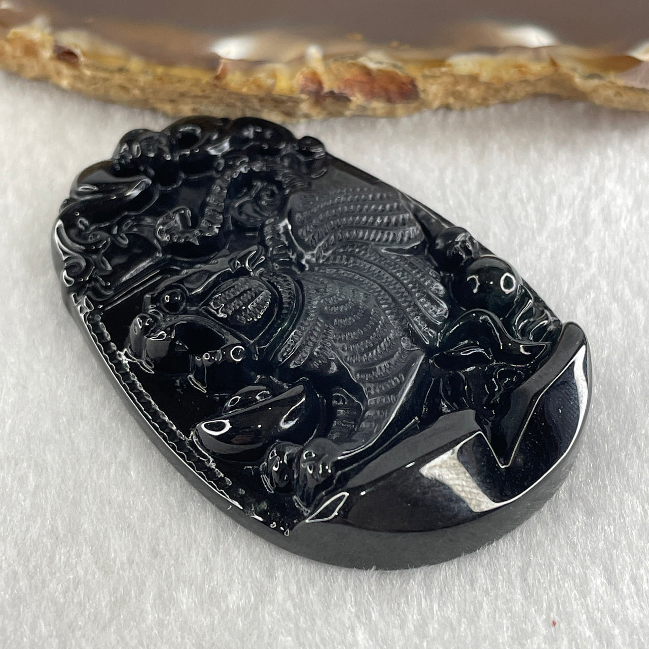 Type A Opaque to Partial Translucent Black Omphacite Jadeite Downhill Tiger Pendant 28.98g 60.9 by 39.8 by 9.0mm - Huangs Jadeite and Jewelry Pte Ltd