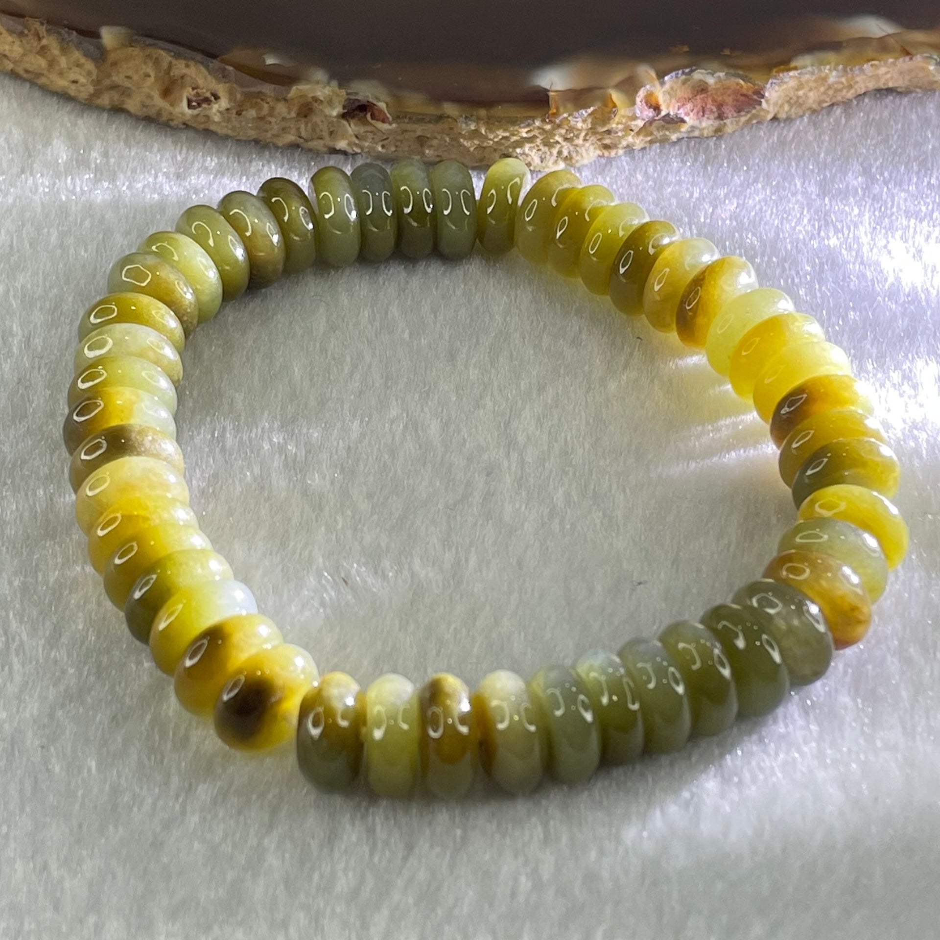 Type A Brown with Blueish Green Jadeite Ping An Kou Donut Beads Bracelet 33.05g 16cm 9.3mm 47pcs - Huangs Jadeite and Jewelry Pte Ltd