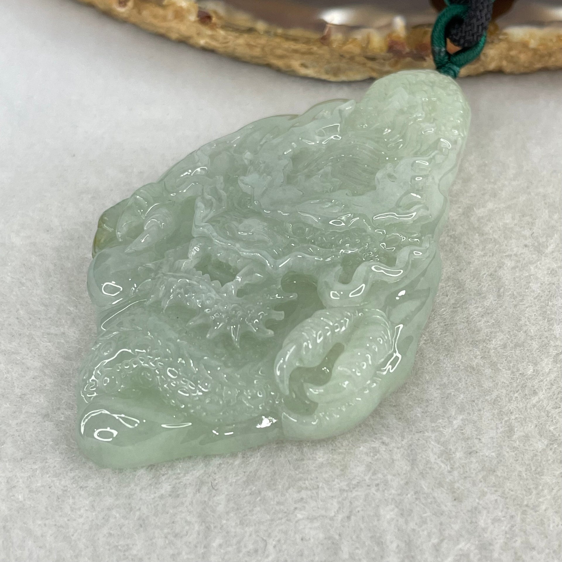 Type A Light Green with Yellow Patch Jadeite Double Sided Dragon Pendant 45.14g 72.2 by 42.7 by 11.4mm - Huangs Jadeite and Jewelry Pte Ltd