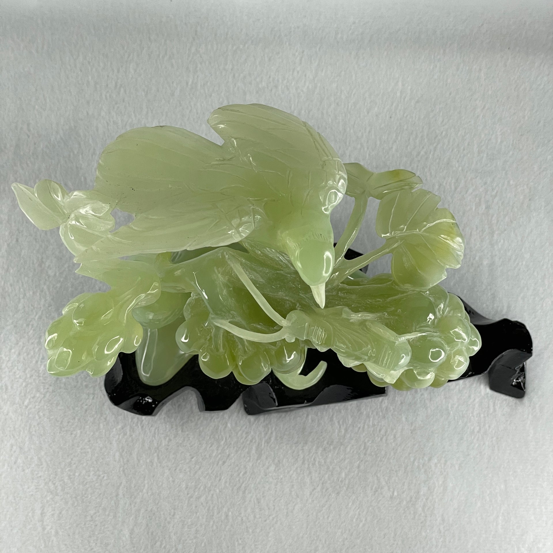 Natural Green Serpentine Magpie Bird with Cricket on Grape with Wooden Stand Display 1,042.7g L195.0 by B105.0 by H180.0 mm - Huangs Jadeite and Jewelry Pte Ltd