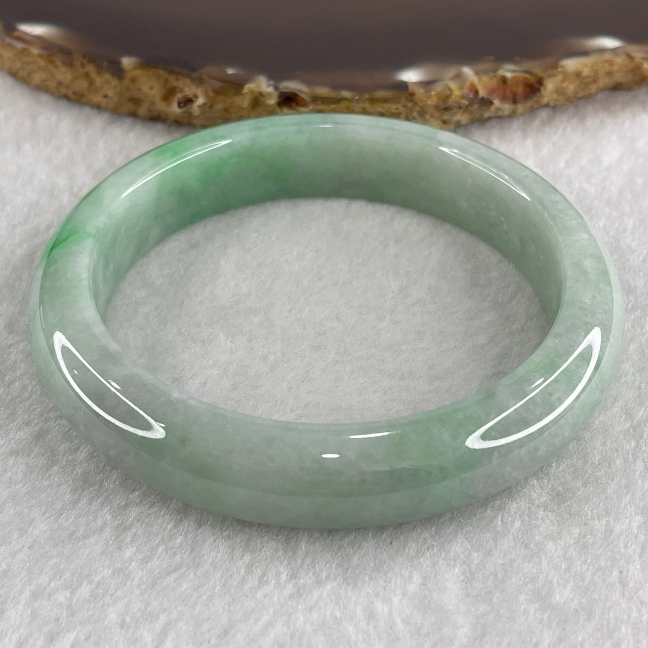 Certified Natural Type A Light Green with Apple Green Piao Hua Jadeite Bangle 57.47g Internal Diameter 57.7mm 12.4 by 10.0mm (Very Slight Internal Line)