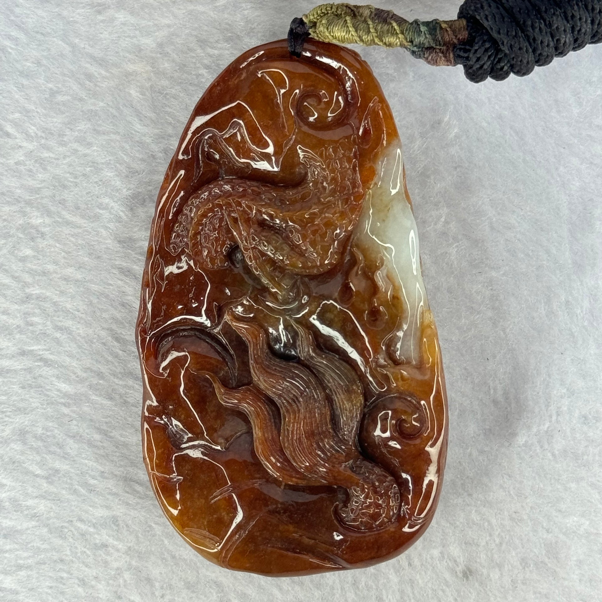 Grand Master Type A Red Jadeite Fire Dragon with Wheel 105.84g 81.5 by 47.0 by 17.5mm - Huangs Jadeite and Jewelry Pte Ltd