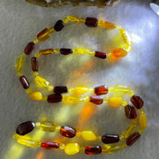 Natural Mixed Color Amber Beads Necklaces 15.42g 62cm 16.0 by 9.9 by 5.2mm, 9.9 by 7.2 by 4.6mm 39 Odd shape pieces - Huangs Jadeite and Jewelry Pte Ltd