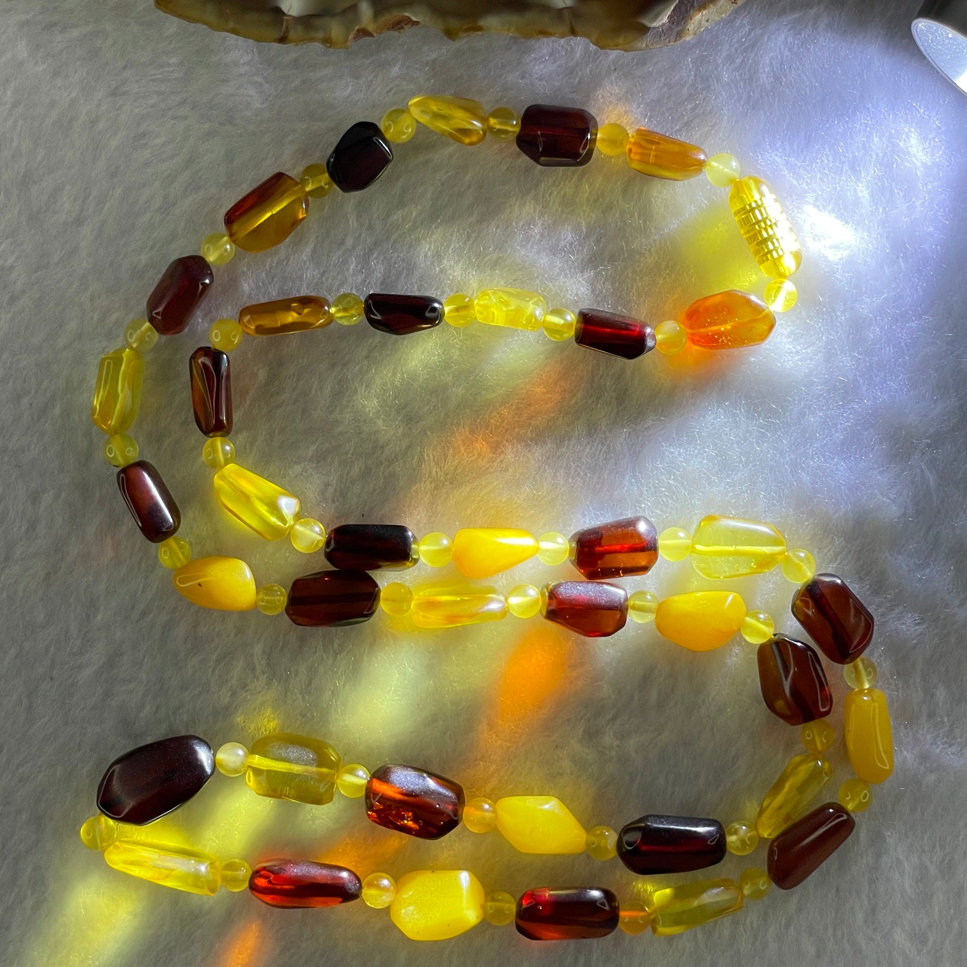 Natural Mixed Color Amber Beads Necklaces 15.42g 62cm 16.0 by 9.9 by 5.2mm, 9.9 by 7.2 by 4.6mm 39 Odd shape pieces - Huangs Jadeite and Jewelry Pte Ltd