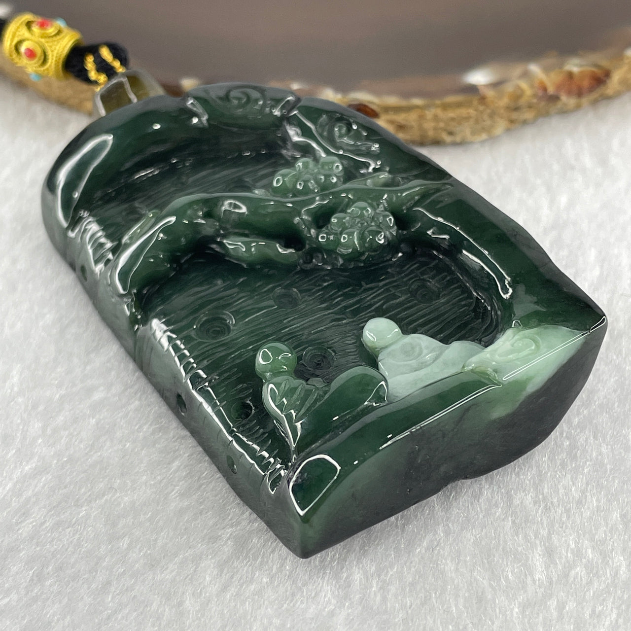 Natural Type A Dark and Light Blueish Green with Dark Brown Jadeite Seeking Enlightenment Pendant 93.08g 73.8 by 45.7 by 18.5mm