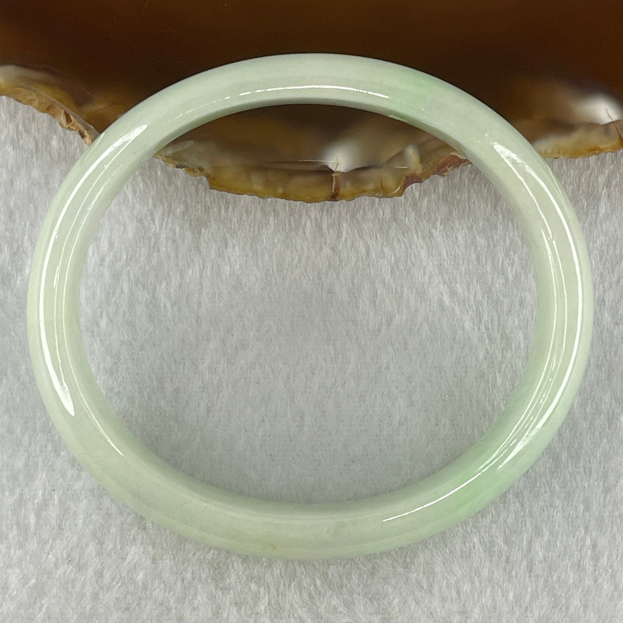 Natural Type A Light Green Jadeite Oval Bangle 36.17g Inner Diameter 54.6mm 12.5 by 6.4mm (Internal Lines) - Huangs Jadeite and Jewelry Pte Ltd