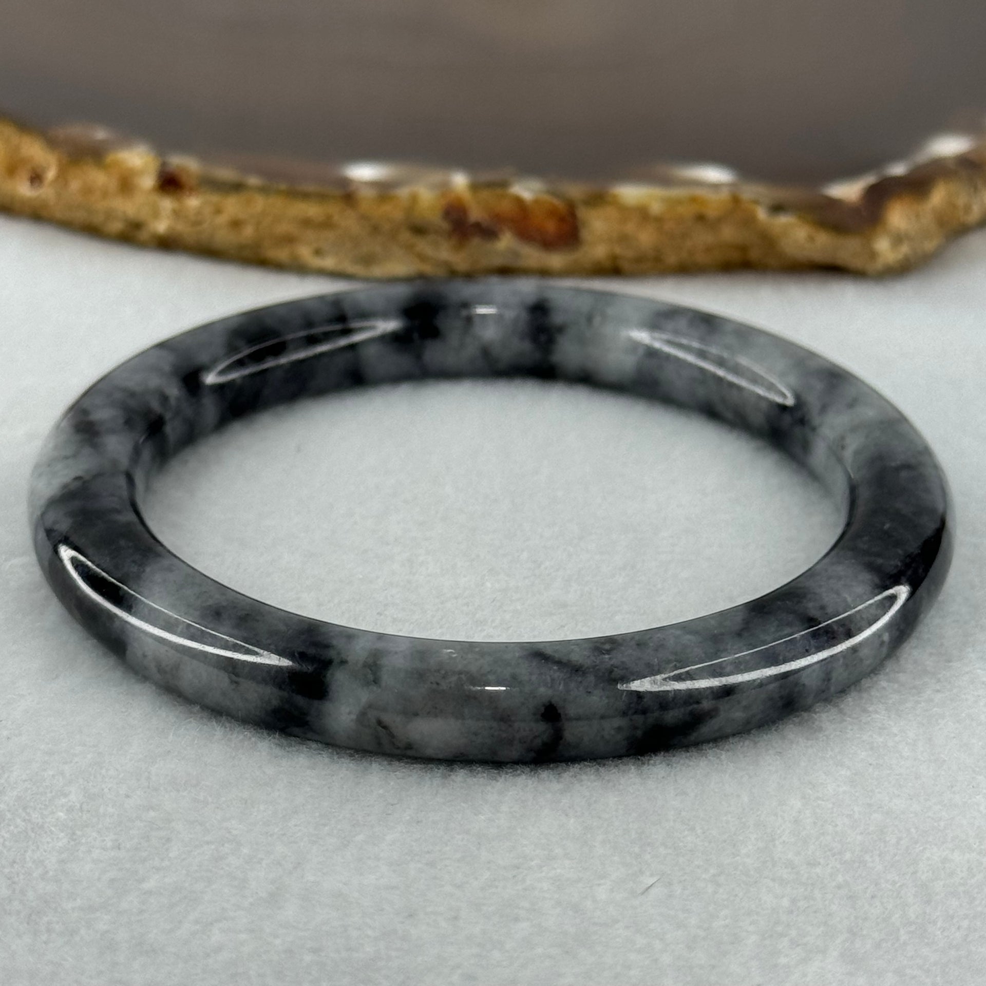 Type A Wuji Grey Black Piao Hua Jadeite Bangle Internal Diameter 55.4mm 39.68g 7.9 by 9.4mm (Slight Internal Lines) - Huangs Jadeite and Jewelry Pte Ltd