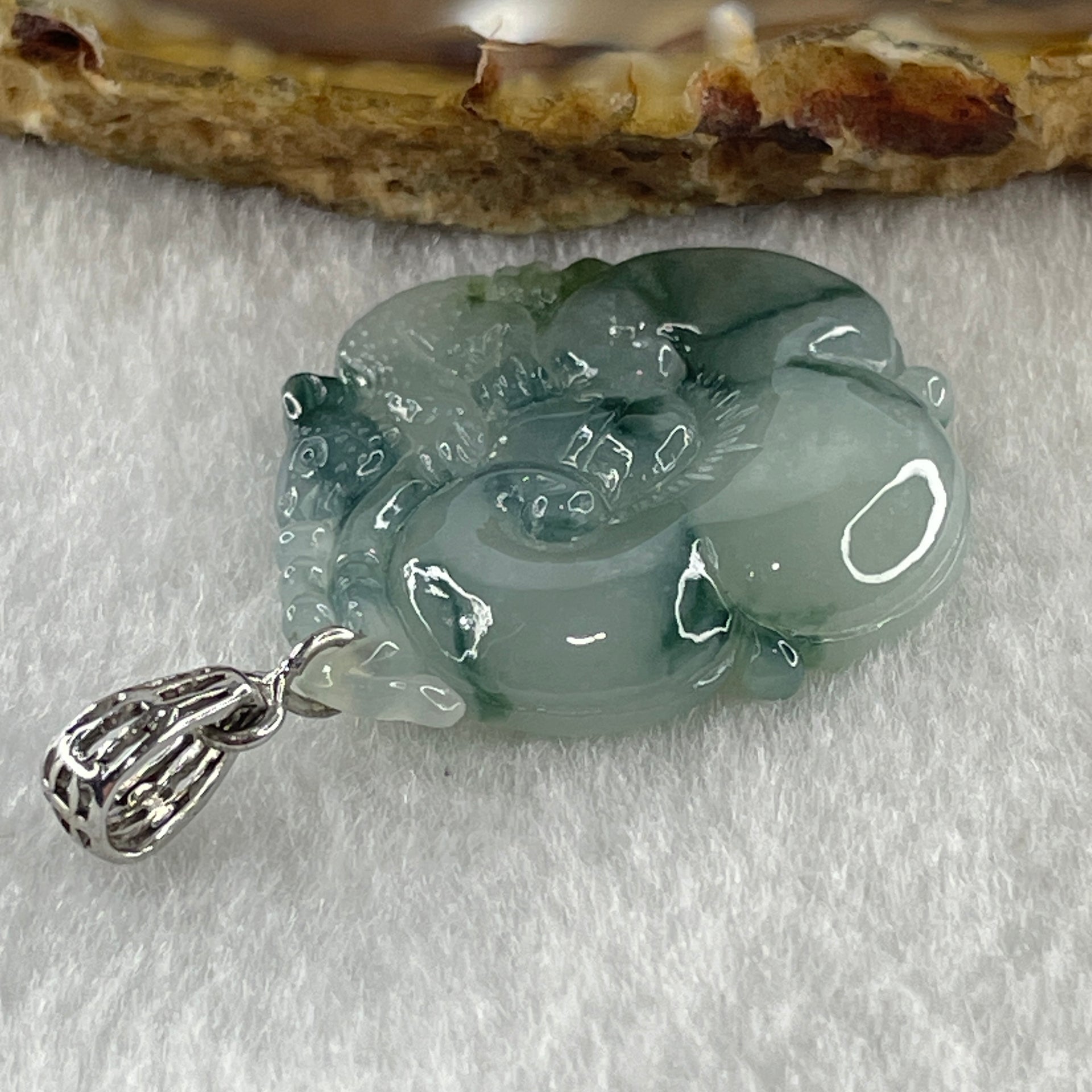 Type A Natural Semi Icy Blueish Green with Piao Hua Flora Jadeite Ruyi in S925 Silver Pendant 6.48g 32.2 by 21.4 by 5.1mm - Huangs Jadeite and Jewelry Pte Ltd