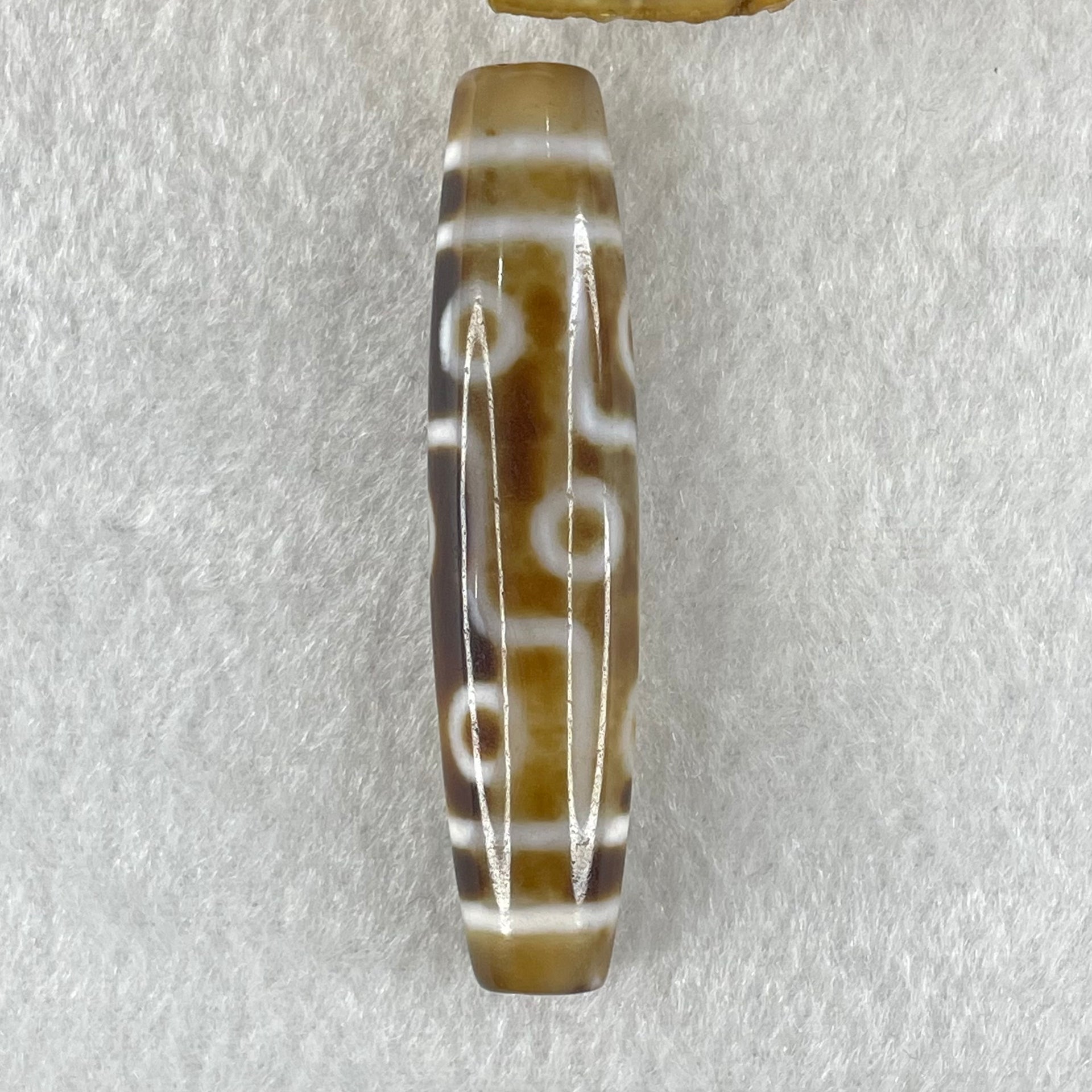 Natural Powerful Tibetan Old Oily Agate Zha Ji La Mu Female Cai Shen Carvings on 9 Eyes Dzi Bead Heavenly Master (Tian Zhu) 九眼扎基拉姆女财神天珠 13.88g 57.4 by 13.3mm - Huangs Jadeite and Jewelry Pte Ltd