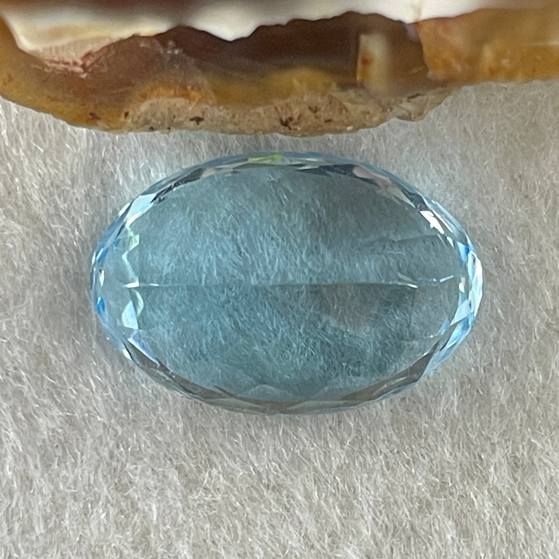 Natural Sky Blue Topaz Oval Shape 15.89ct 18.0 by 12.4 by 8.1mm - Huangs Jadeite and Jewelry Pte Ltd