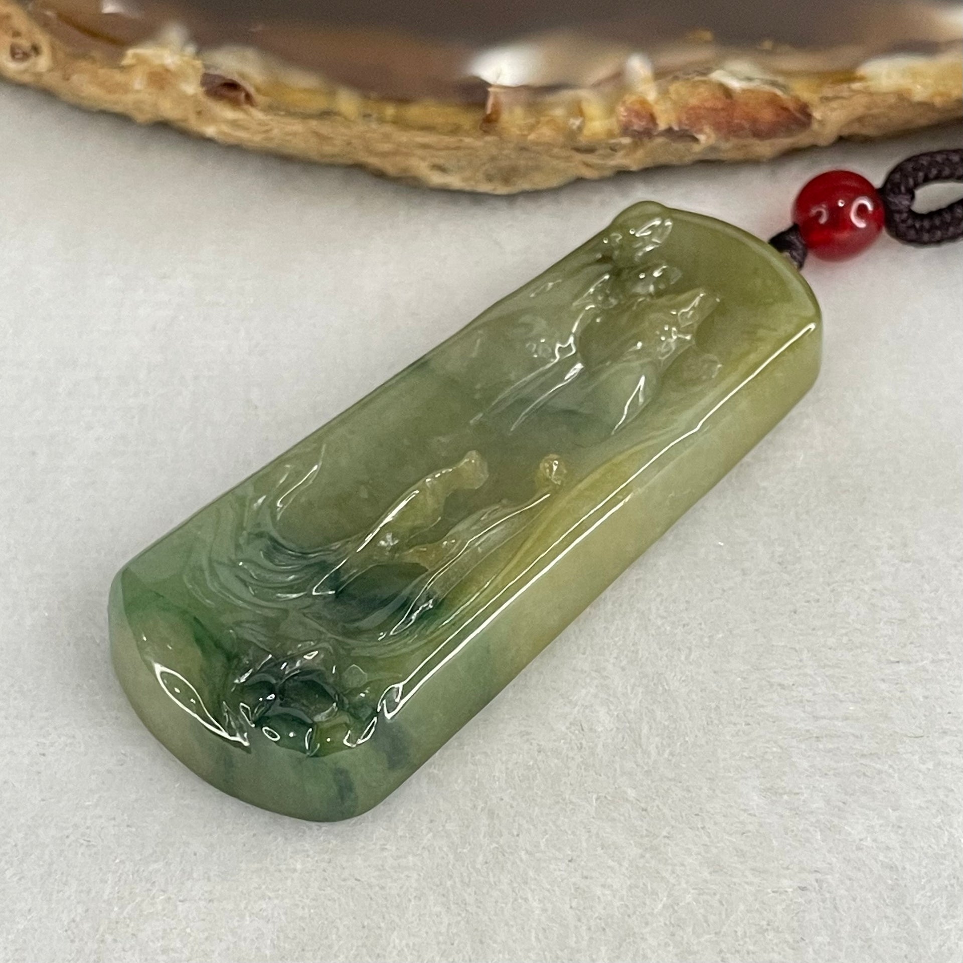 Type A Green with Yellow and Blueish Green Patches Jadeite Shan Shui with Guiren Benefactor seeking Enlightenment Pendant 18.17g 51.1 by 20.5 by 6.7mm - Huangs Jadeite and Jewelry Pte Ltd