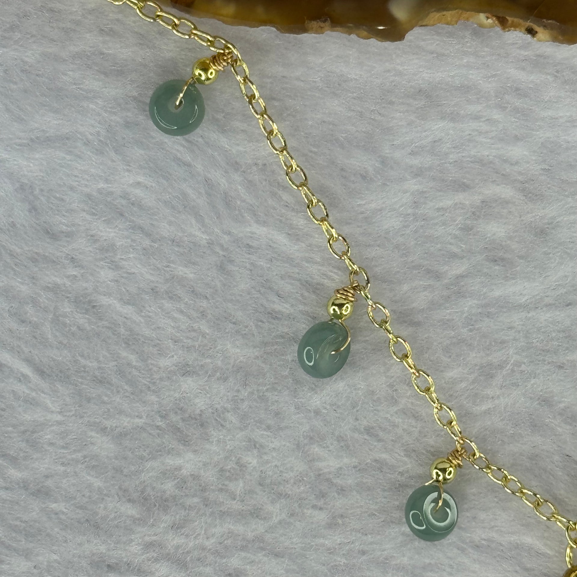 Type A Icy Blueish Green Jadeite God of Fortune Cai Shen Ye Pendent In Gold Color Necklace 8.61g 38.2 by 15.8 by 3.8mm - Huangs Jadeite and Jewelry Pte Ltd