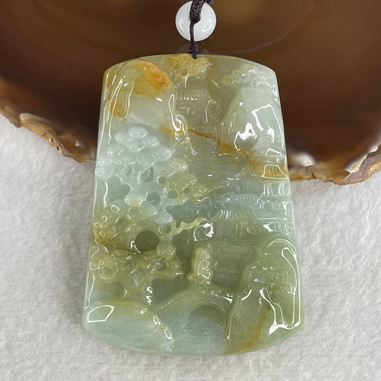 Natural Type A Sky Blue with Yellowish Green Jadeite Shan Shui with Gui Ren Benefactor Pendant 94.26g 75.5 by 55.5 by 10.5mm - Huangs Jadeite and Jewelry Pte Ltd