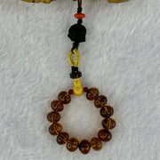 Natural Cognac Amber with Damo Head Handphone Strap 4.30g 7.6mm 13 Beads - Huangs Jadeite and Jewelry Pte Ltd