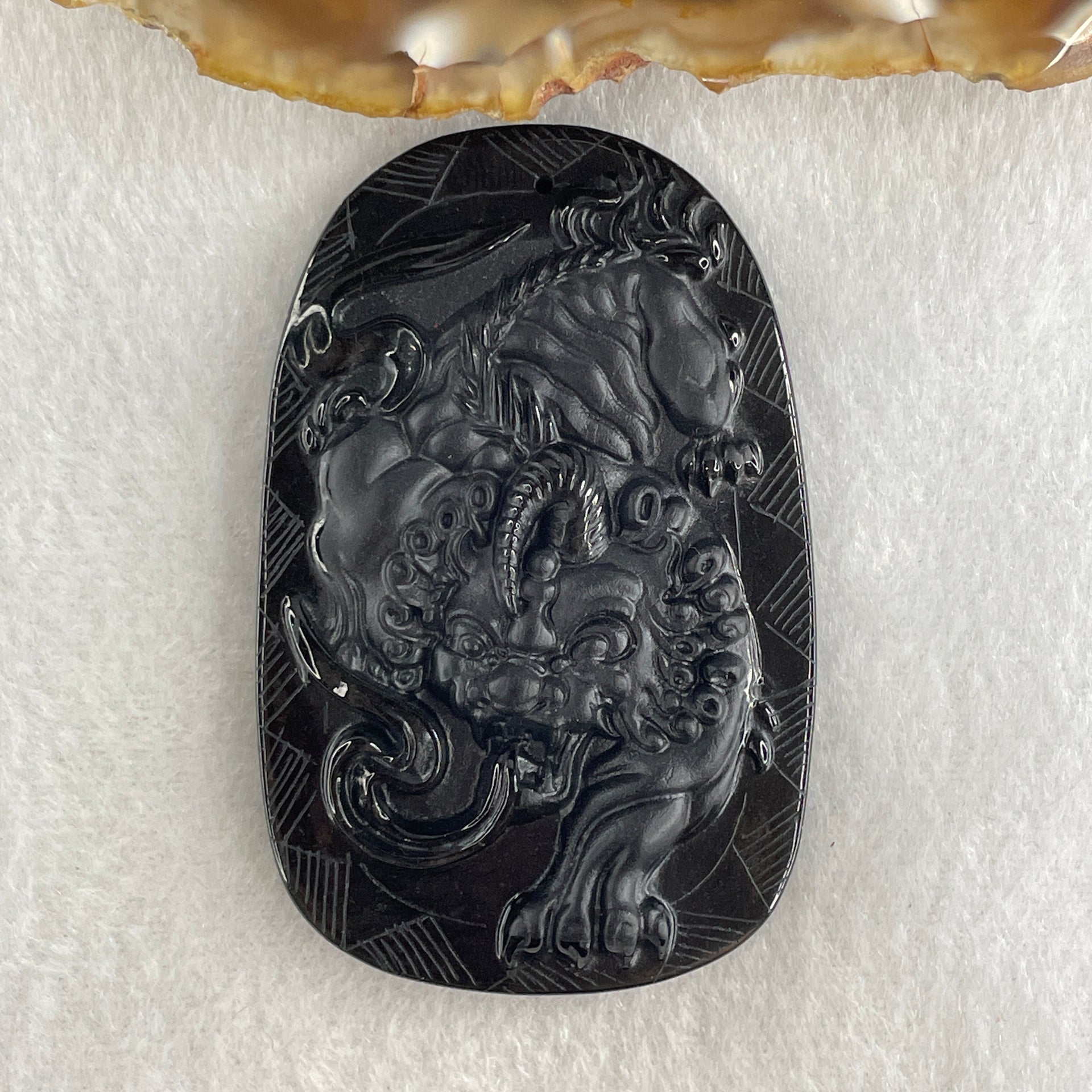 Type A Opaque to Partial Translucent Black Omphacite Jadeite Pixiu Pendant 23.77g 63.4 by 40.9 by 8.3mm - Huangs Jadeite and Jewelry Pte Ltd