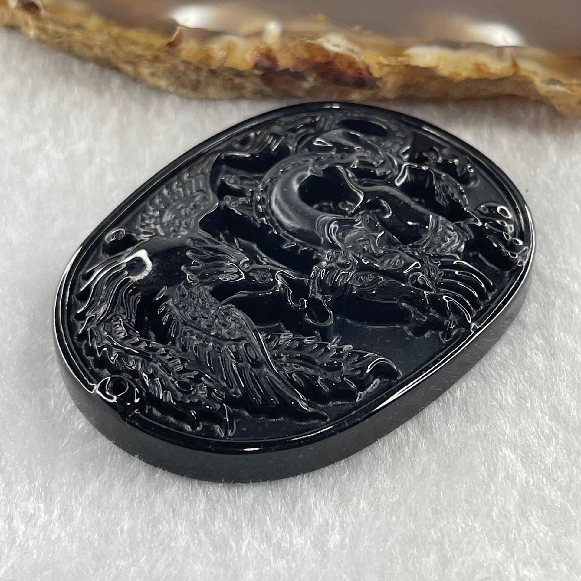 Type A Opaque to Partial Translucent Black Omphacite Jadeite Dragon and Phoenix Pendant 20.96g 50.2 by 38.3 by 8.4mm - Huangs Jadeite and Jewelry Pte Ltd