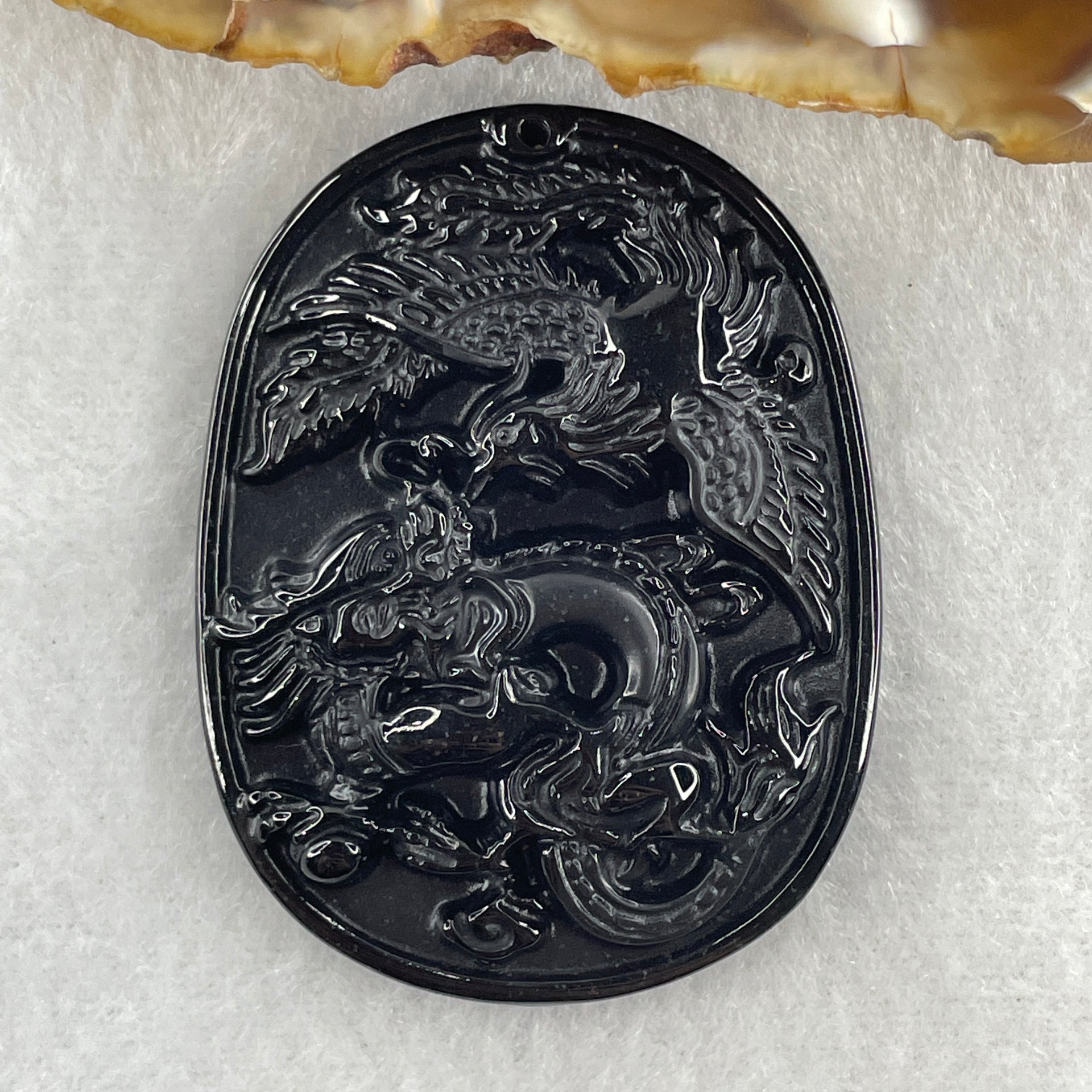 Type A Opaque to Partial Translucent Black Omphacite Jadeite Dragon and Phoenix Pendant 20.96g 50.2 by 38.3 by 8.4mm - Huangs Jadeite and Jewelry Pte Ltd