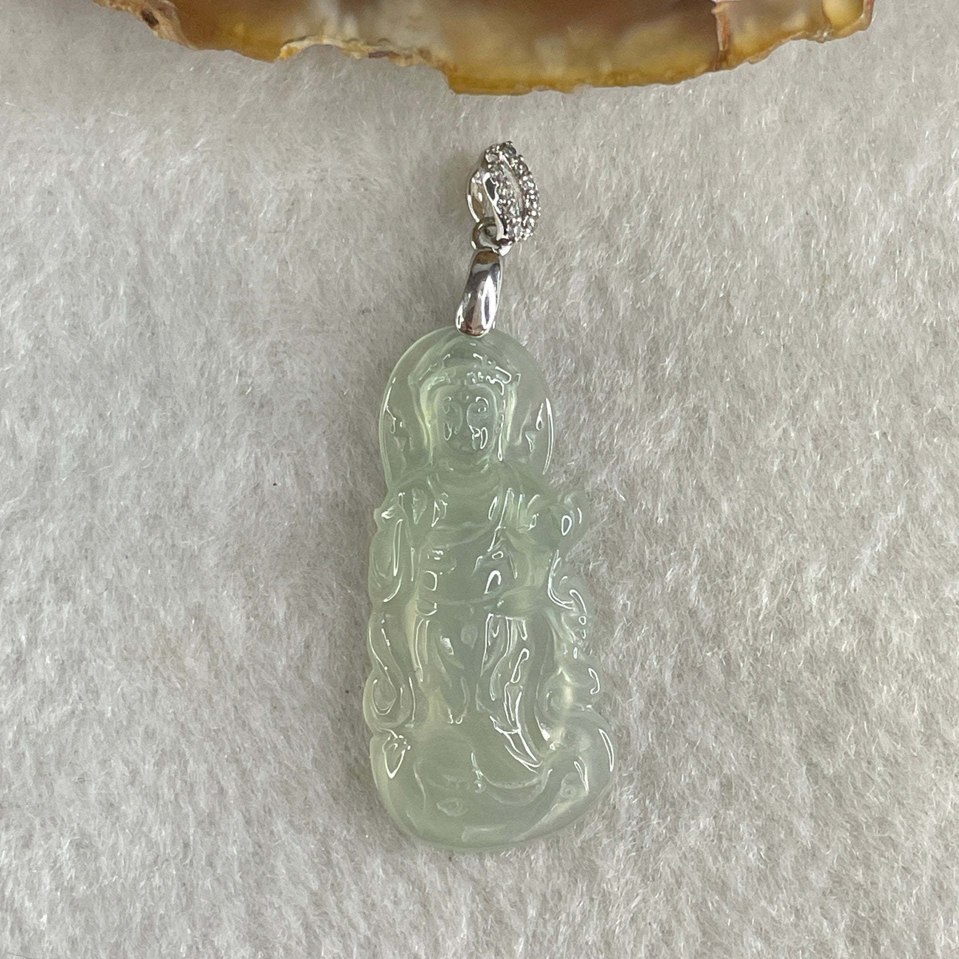 Type A Icy Colourless to Faint Green Jadeite Guan Yin Pendant 3.0g 31.0 by 14.5 by 3.5mm - Huangs Jadeite and Jewelry Pte Ltd