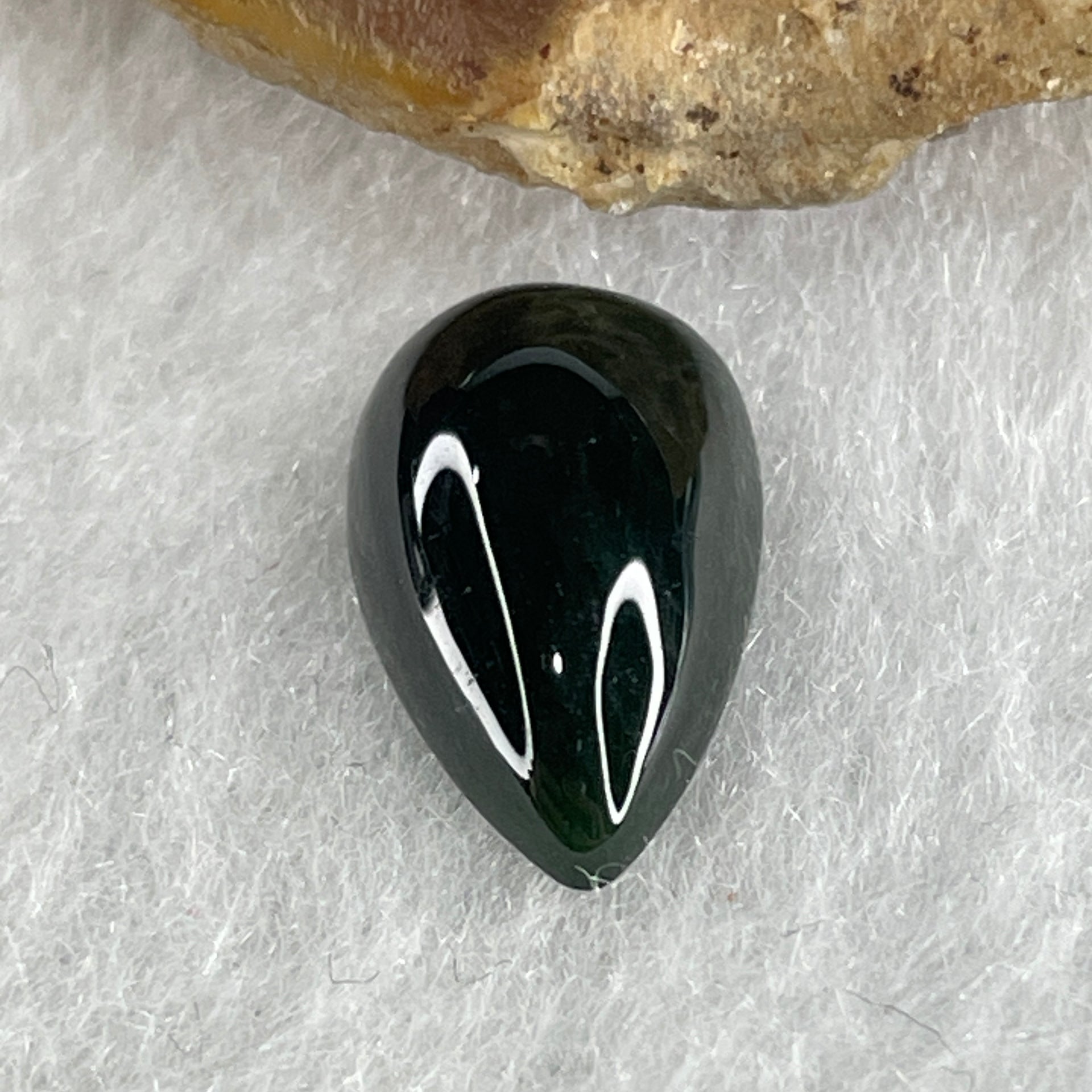 Type A Translucent Black Omphacite Jadeite Tear Drop Cabouchon Stone For Setting 0.87g 14.2 by 8.3 by 4.6mm - Huangs Jadeite and Jewelry Pte Ltd