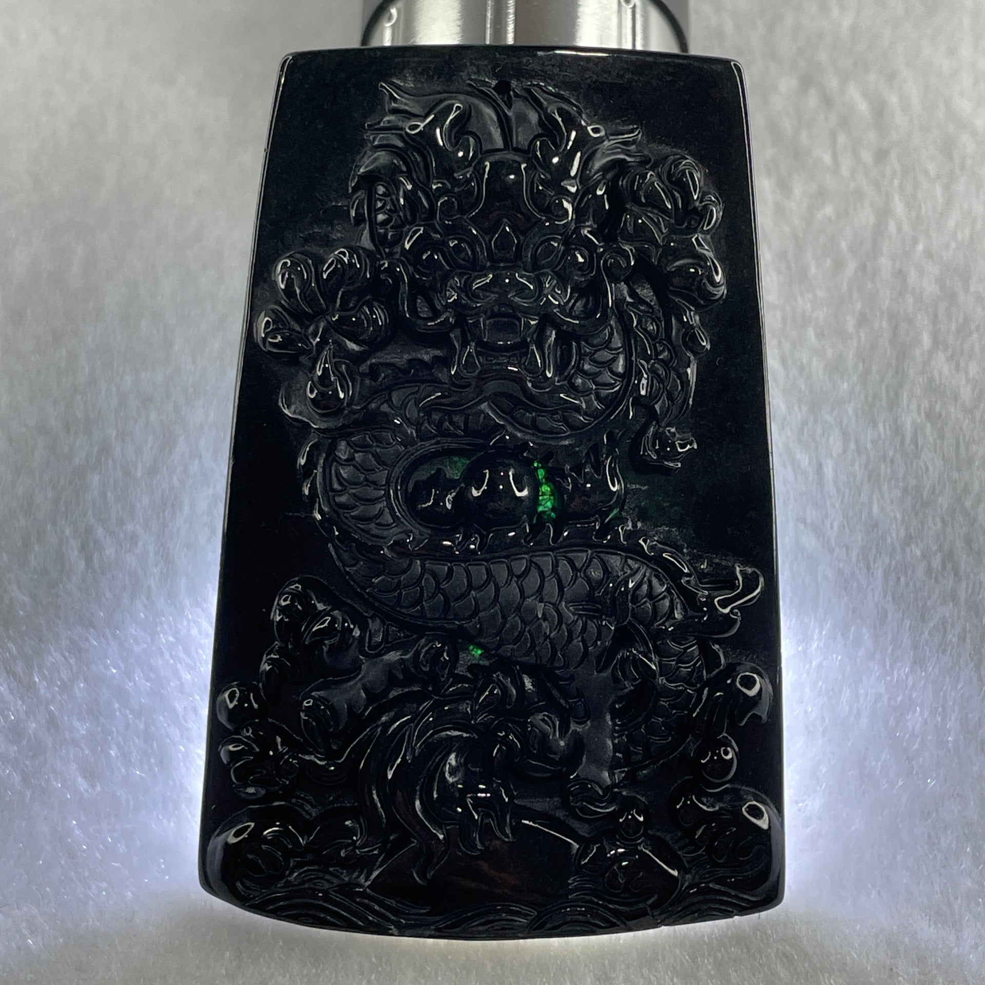 Type A Opaque to Partial Translucent Black Omphacite Jadeite Dragon Pendant 30.25g 64.4 by 42.8 by 8.2mm - Huangs Jadeite and Jewelry Pte Ltd