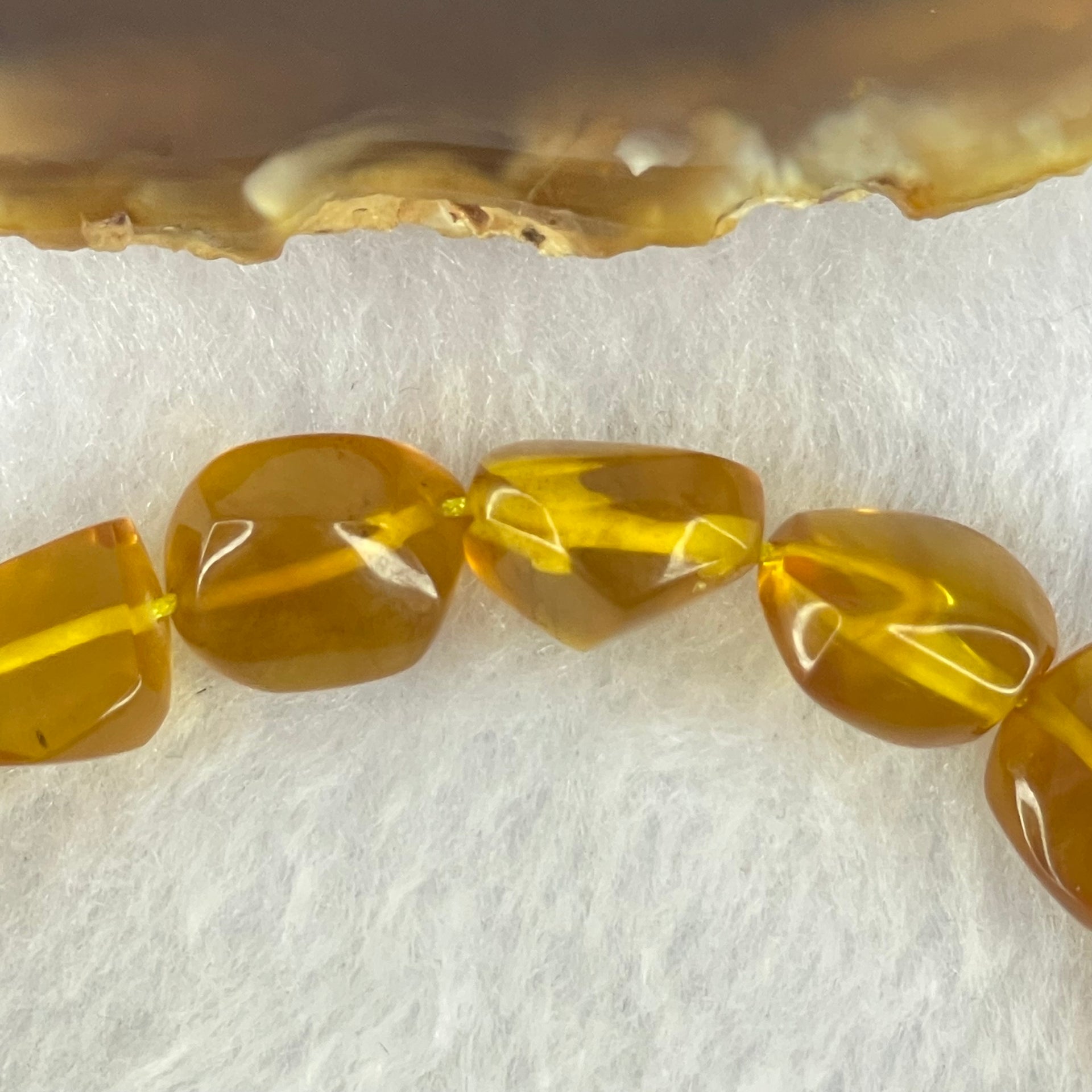 Natural Yellow Amber Fragments Bracelet 11.18g 18cm 15.4 by 10.2 by 8.1mm 15pcs - Huangs Jadeite and Jewelry Pte Ltd