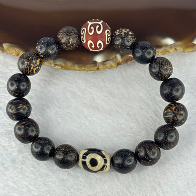 Natural Agarwood With 3 Eyes Dzi Bead Tian Zhu Beads Bracelet 天然沉香带三眼天珠手链 17.61g 16.5cm Dzi 14.1 by 10.6 and 13.9mm 1 Bead and 10.9mm 16 Beads - Huangs Jadeite and Jewelry Pte Ltd