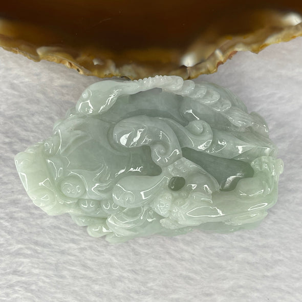 Type A Sky Blue Jadeite Pixiu with Baby Pixiu on Prosperity Coin 182.77g 70.0 by 45.7 by 31.4mm - Huangs Jadeite and Jewelry Pte Ltd