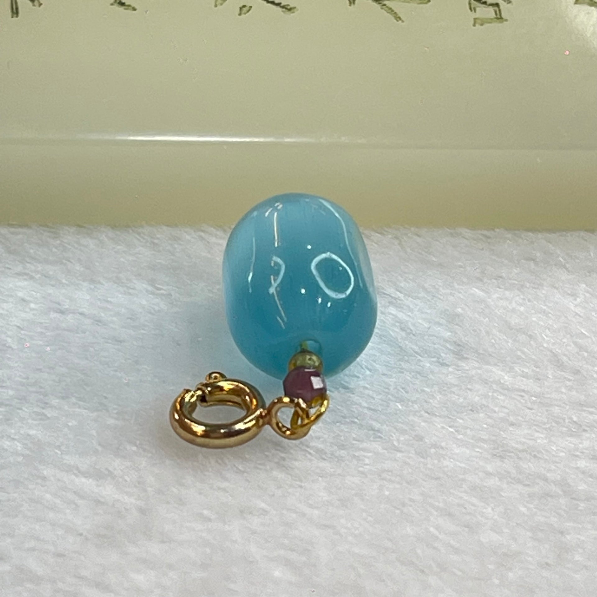 Blue Cat's Eye Glass Charm Pendent 2.31g 13.7 by 9.7mm - Huangs Jadeite and Jewelry Pte Ltd