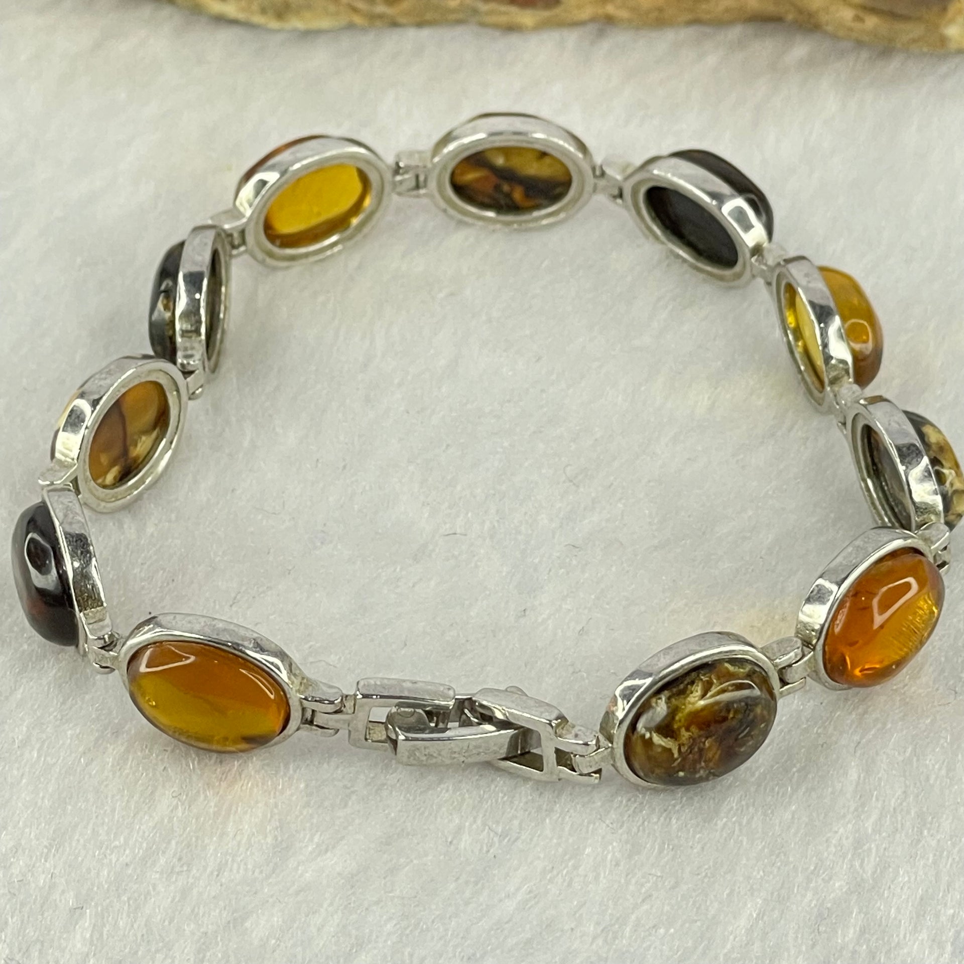 Natural Mixed Color Amber Beads in Sliver Bracelet 天然抚顺多宝手链 11.11g 16.5cm 10.0 by 7.9 by 4.0mm 11pcs - Huangs Jadeite and Jewelry Pte Ltd