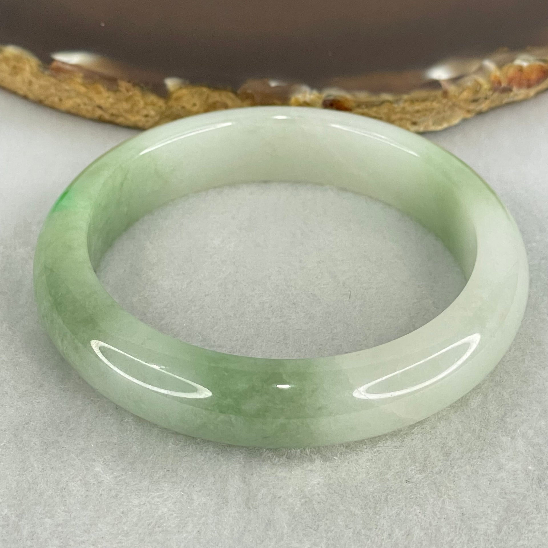 Type A Light Green with Green Patches Jadeite Bangle Internal Diameter 53.8mm 50.57g 12.3 by 7.9mm (Internal Lines) - Huangs Jadeite and Jewelry Pte Ltd