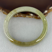 Type A Yellowish Green Lavender Jadeite Oval Bangle Internal Diameter 58.5mm 67.31g 10.7 by 8.1mm (Very Slight Fine Internal Line) - Huangs Jadeite and Jewelry Pte Ltd