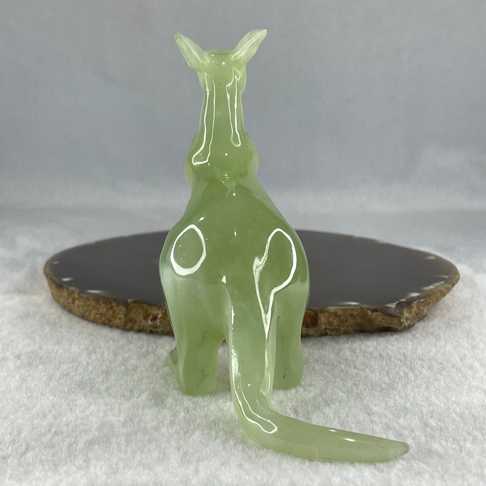 Natural Green Serpentine Kangaroo with Baby with Wooden Stand Display 235.6g 125.0 by 63.8 by 116.5mm - Huangs Jadeite and Jewelry Pte Ltd