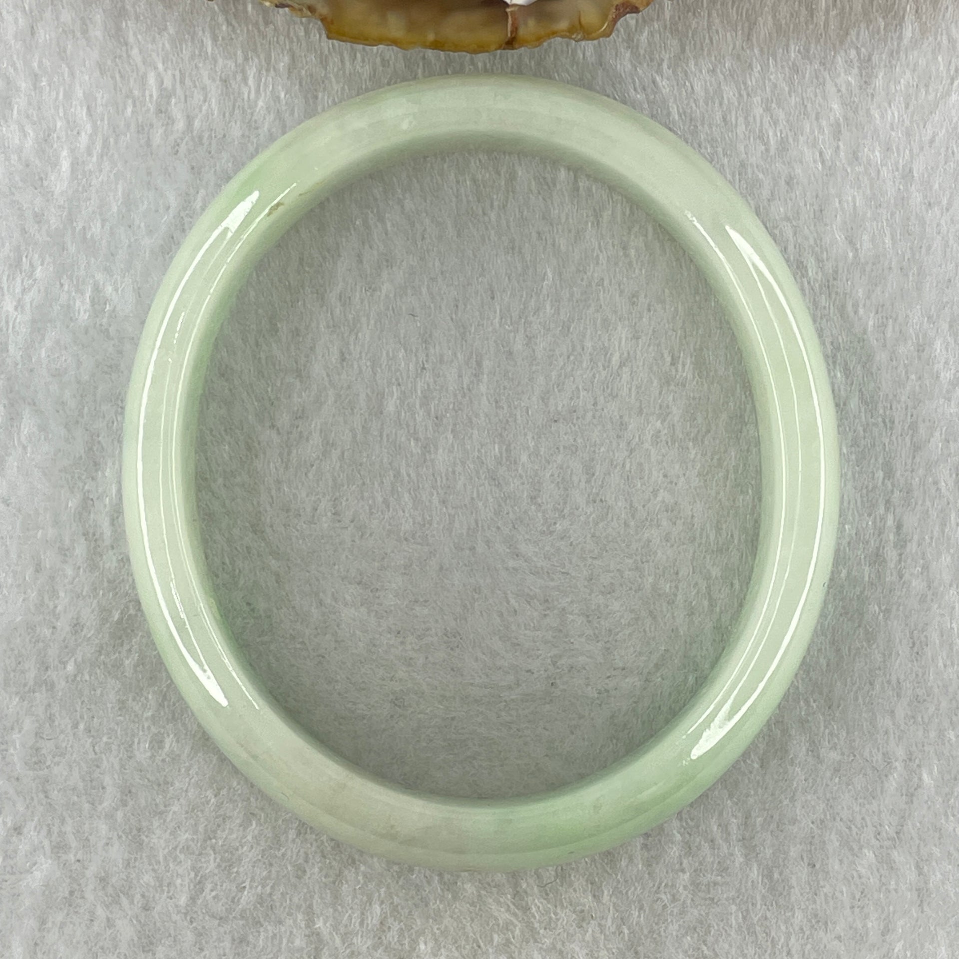 Natural Type A Light Green Jadeite Oval Bangle 36.17g Inner Diameter 54.6mm 12.5 by 6.4mm (Internal Lines) - Huangs Jadeite and Jewelry Pte Ltd