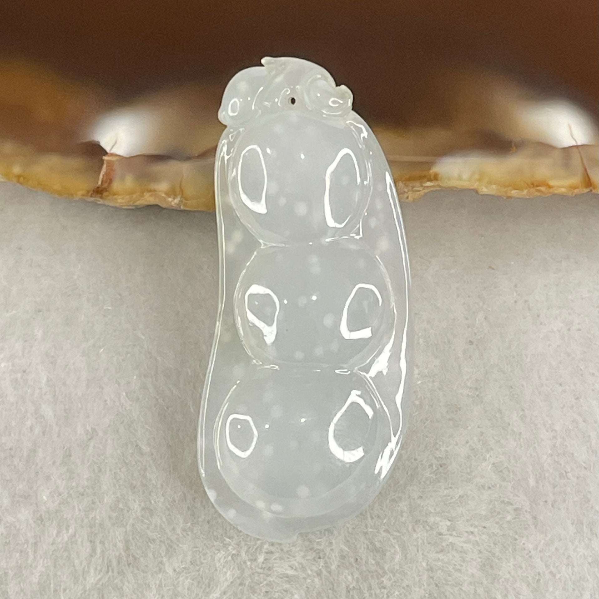 Type A Semi Icy Faint Green with Muna Jadeite Peapod Pendant 5.34g 35.5 by 15.5 by 5.9mm - Huangs Jadeite and Jewelry Pte Ltd