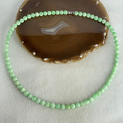 Good Grade Type A Apple Green with Emerald Green Piao Hua Jadeite Beads Necklace 55.48g 54cm 7.1 to 8.2mm 73 Beads - Huangs Jadeite and Jewelry Pte Ltd