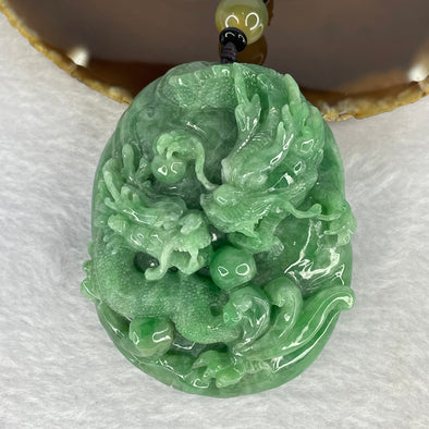 Rare Type A Good Translucent Full Green Jadeite Double Dragon and Coin with Hand Play String 罕见 A 货半透明全绿翡翠双龙手把件 181.89g 72.1 by 57.60 by 30.70mm with NGI Cert No. 82823875 - Huangs Jadeite and Jewelry Pte Ltd
