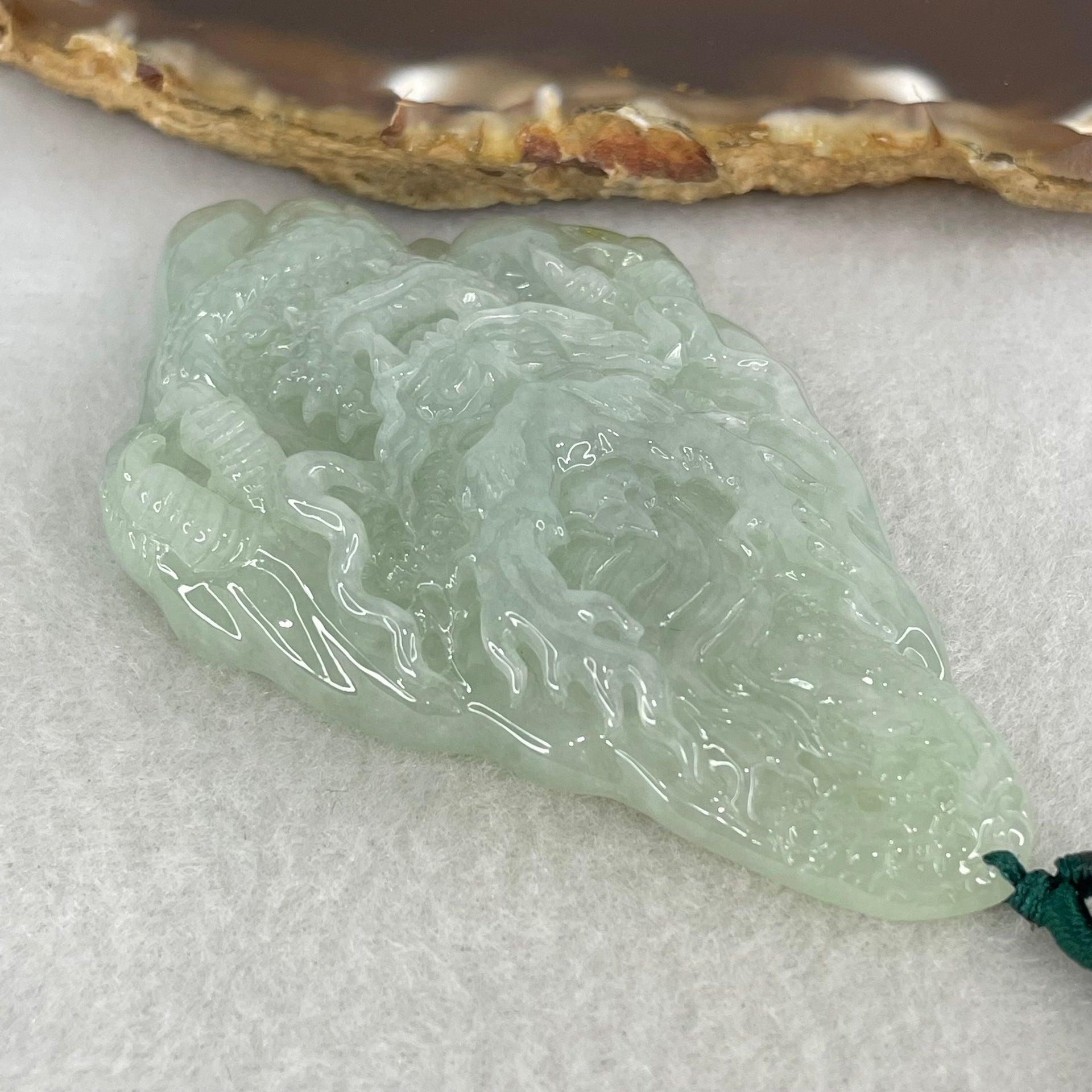 Type A Light Green with Yellow Patch Jadeite Double Sided Dragon Pendant 45.14g 72.2 by 42.7 by 11.4mm - Huangs Jadeite and Jewelry Pte Ltd