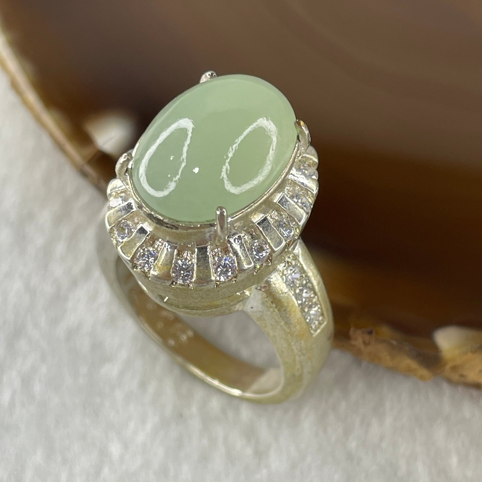 Type A Natural Light Green Jadeite Cabochon 15.2 by 10.8 by 5.0mm Stone for Setting 15.64g (On Silver Ring Mold) US 8.25 HK 18.3 - Huangs Jadeite and Jewelry Pte Ltd