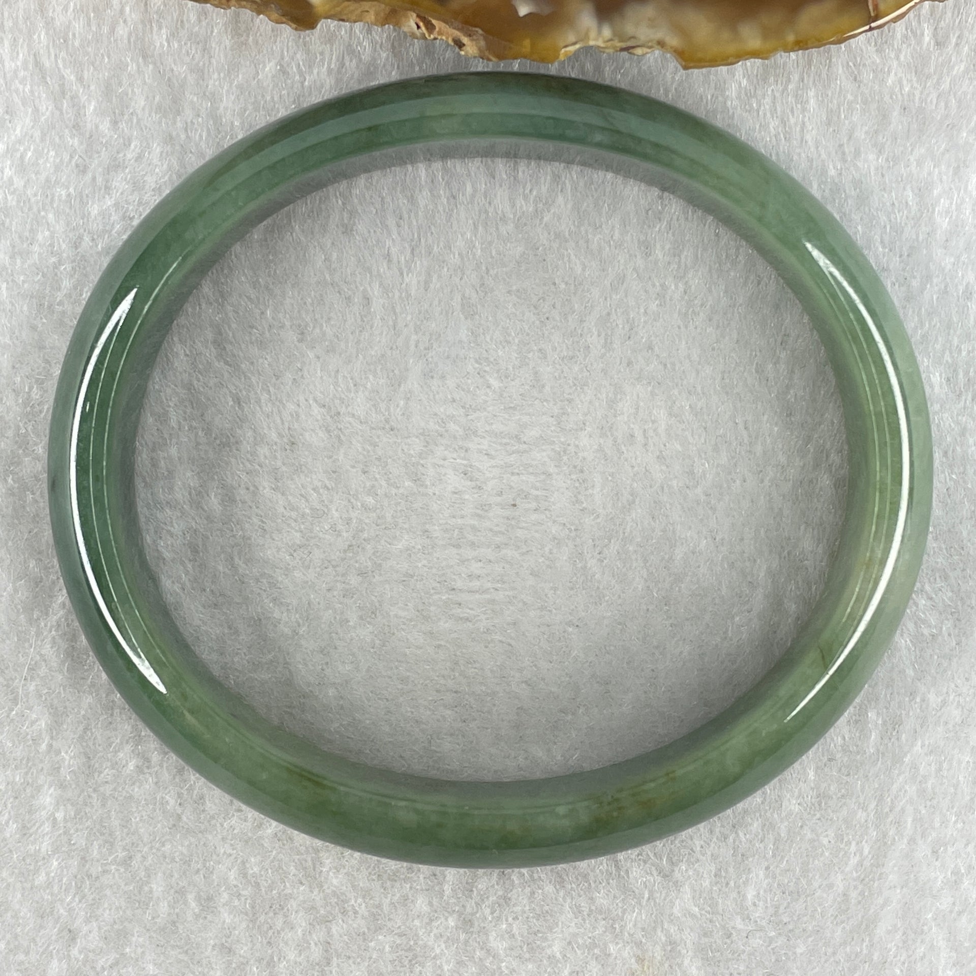 Type A Natural Oily Green Jadeite Oval Bangle 38.02g Inner Diameter 57.8mm 13.0 by 6.1mm (Very Slight Internal Lines) - Huangs Jadeite and Jewelry Pte Ltd