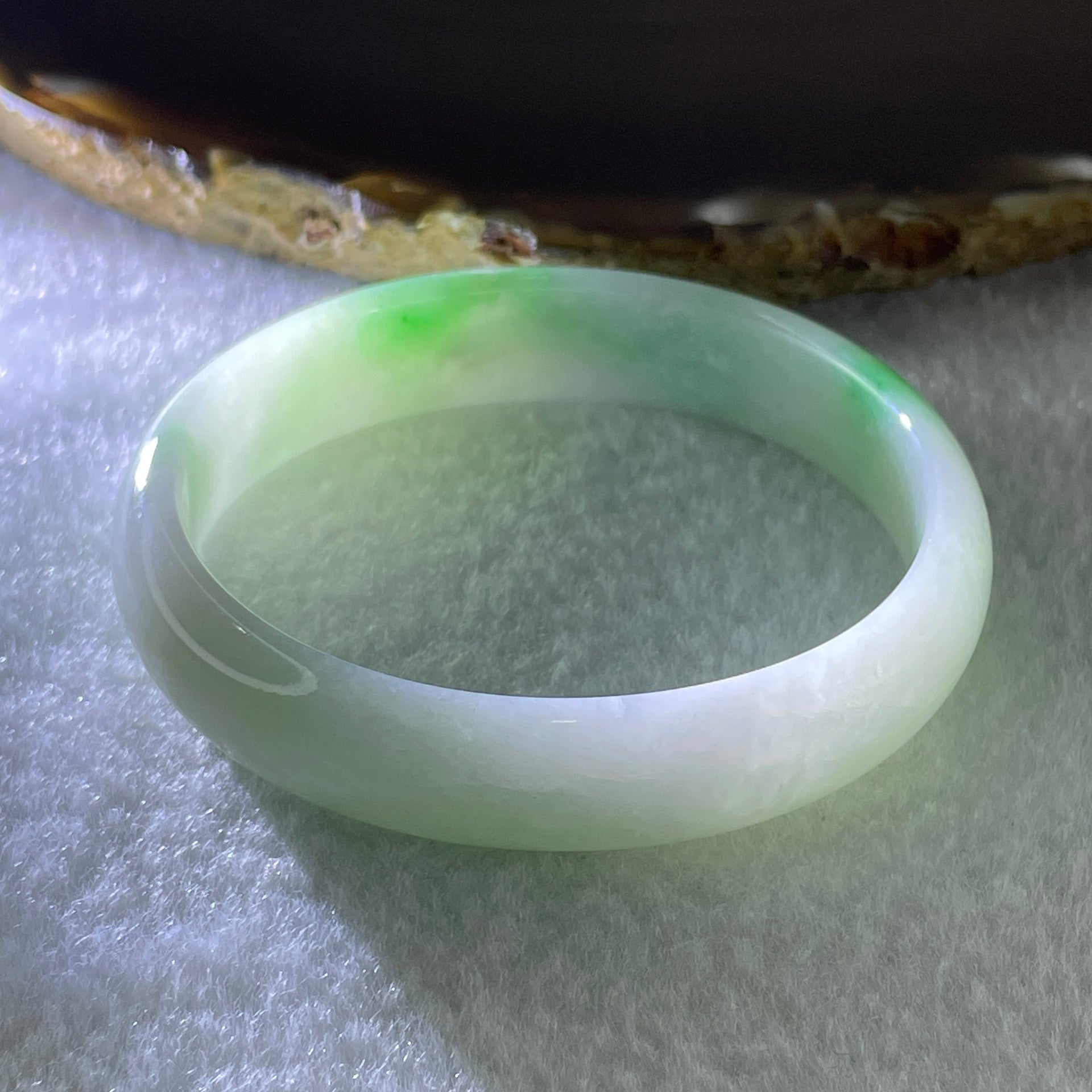 Type A Natural Light Green Faint Lavender with Emerald Green Patches Jadeite Oval Bangle 31.66g Inner Diameter 53.4mm 12.2 by 5.7mm (Internal Lines) - Huangs Jadeite and Jewelry Pte Ltd