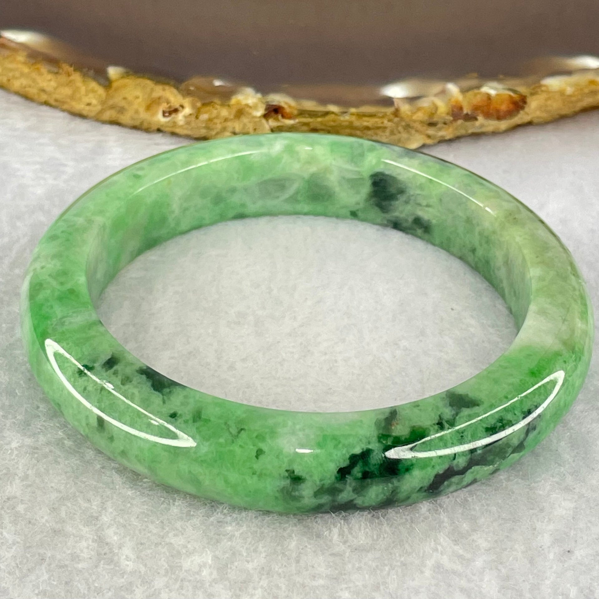 Type A Spicy Green With Dark Green Piao Hua Jadeite Bangle Internal Diameter 56.3mm 58.27g 11.9 by 9.0mm (Close to Perfect) - Huangs Jadeite and Jewelry Pte Ltd