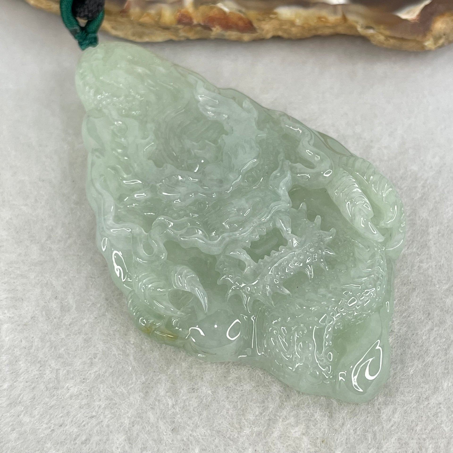 Type A Light Green with Yellow Patch Jadeite Double Sided Dragon Pendant 45.14g 72.2 by 42.7 by 11.4mm - Huangs Jadeite and Jewelry Pte Ltd