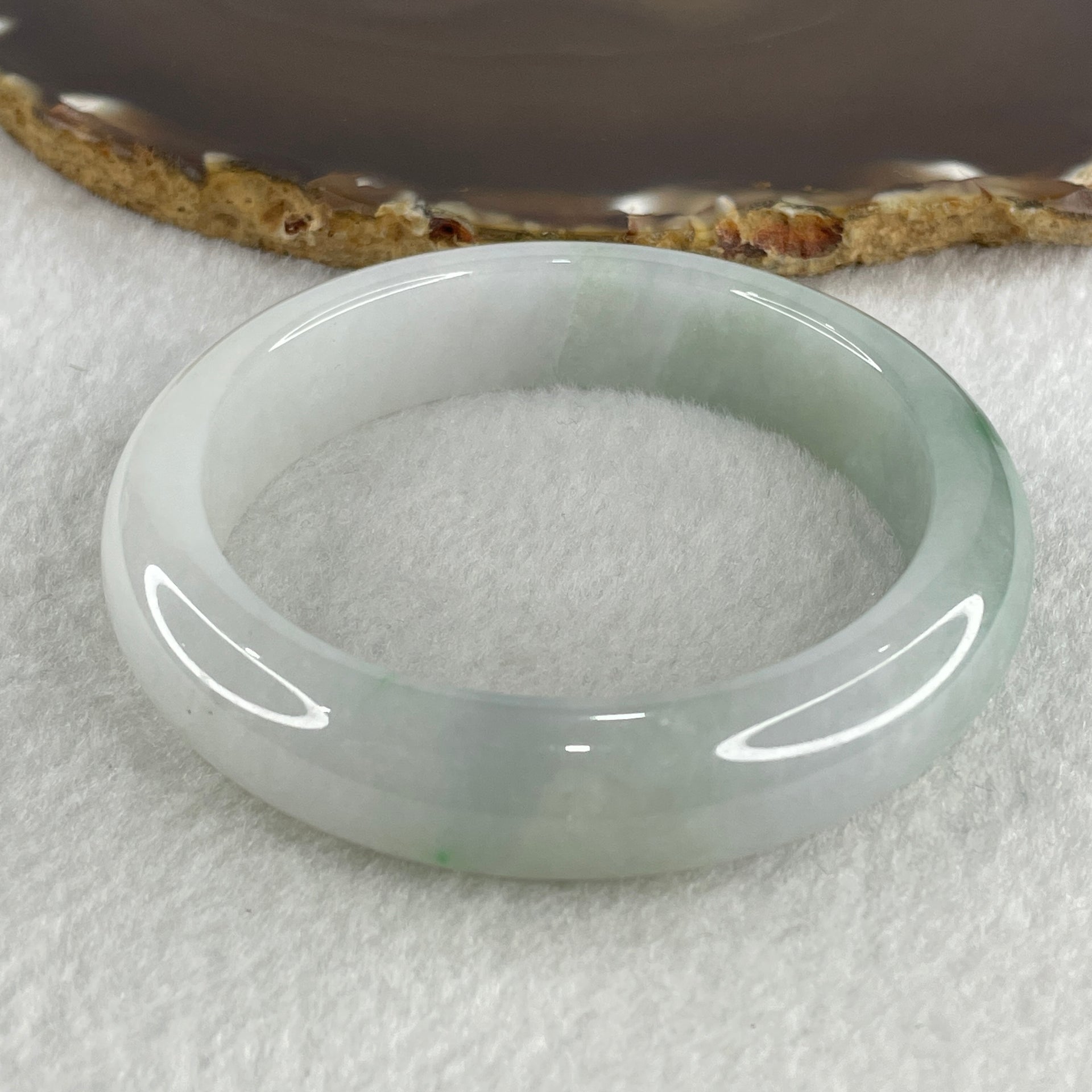 Type A Natural Jelly Light Green with Faint Lavender with Spicy Green Spot Jadeite Bangle 70.15g Inner Diameter 57.8mm 14.3 by 9.6mm (Close to Perfect) - Huangs Jadeite and Jewelry Pte Ltd