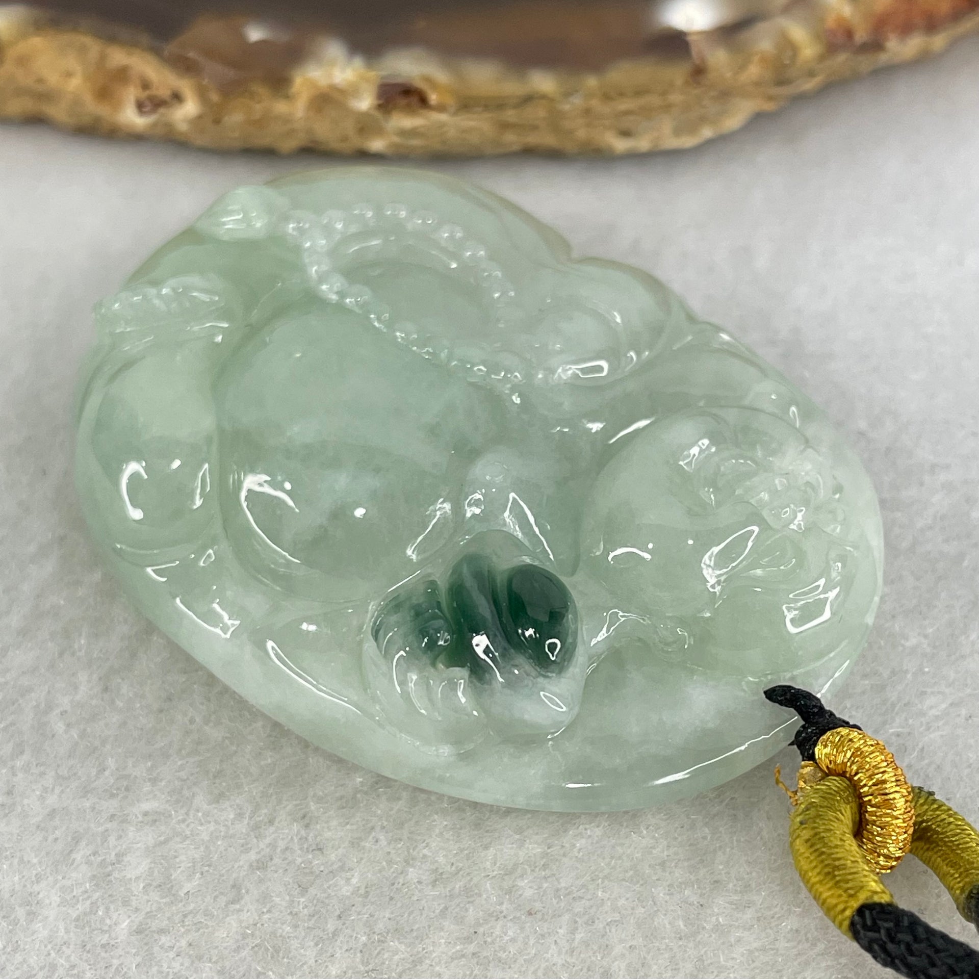 Type A Light Green with Dark Green Spot Jadeite Milo Buddha Pendant 37.98g 48.2 by 34.5 by 12.6mm - Huangs Jadeite and Jewelry Pte Ltd