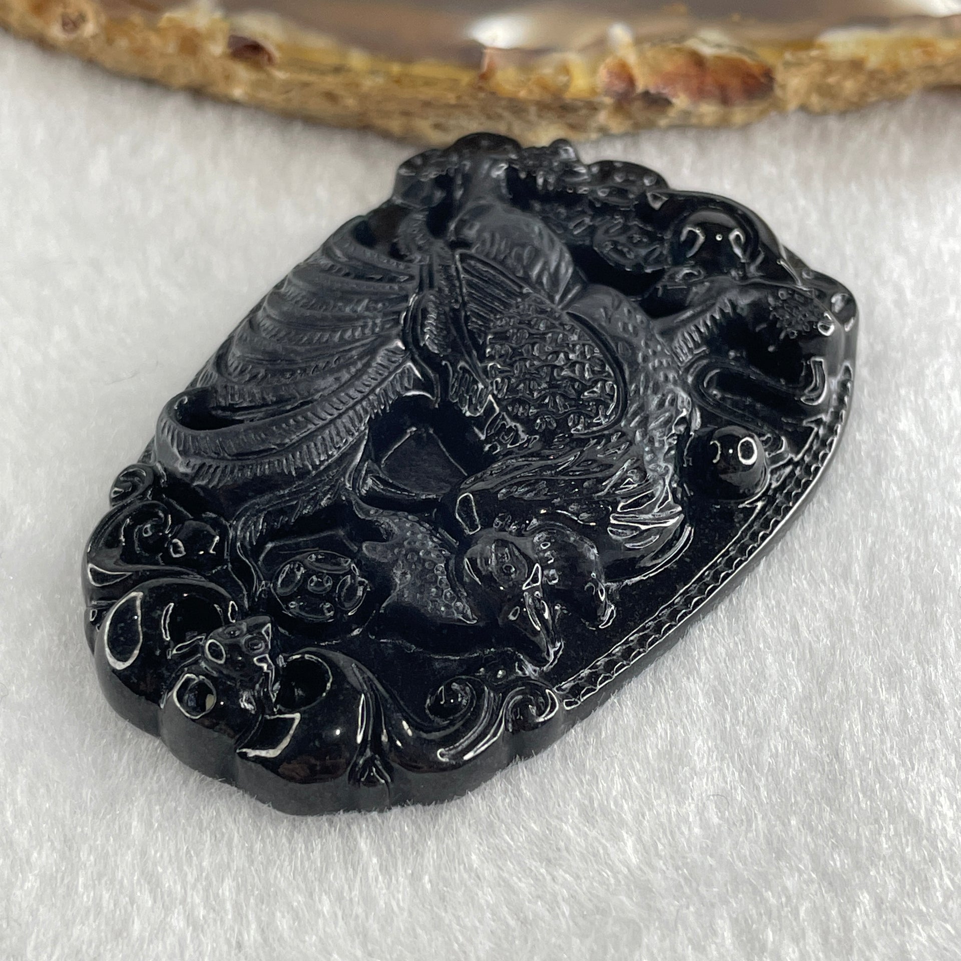 Type A Opaque to Partial Translucent Black Omphacite Jadeite Rooster Pendant 25.65g 59.3 by 40.1 by 8.9mm - Huangs Jadeite and Jewelry Pte Ltd