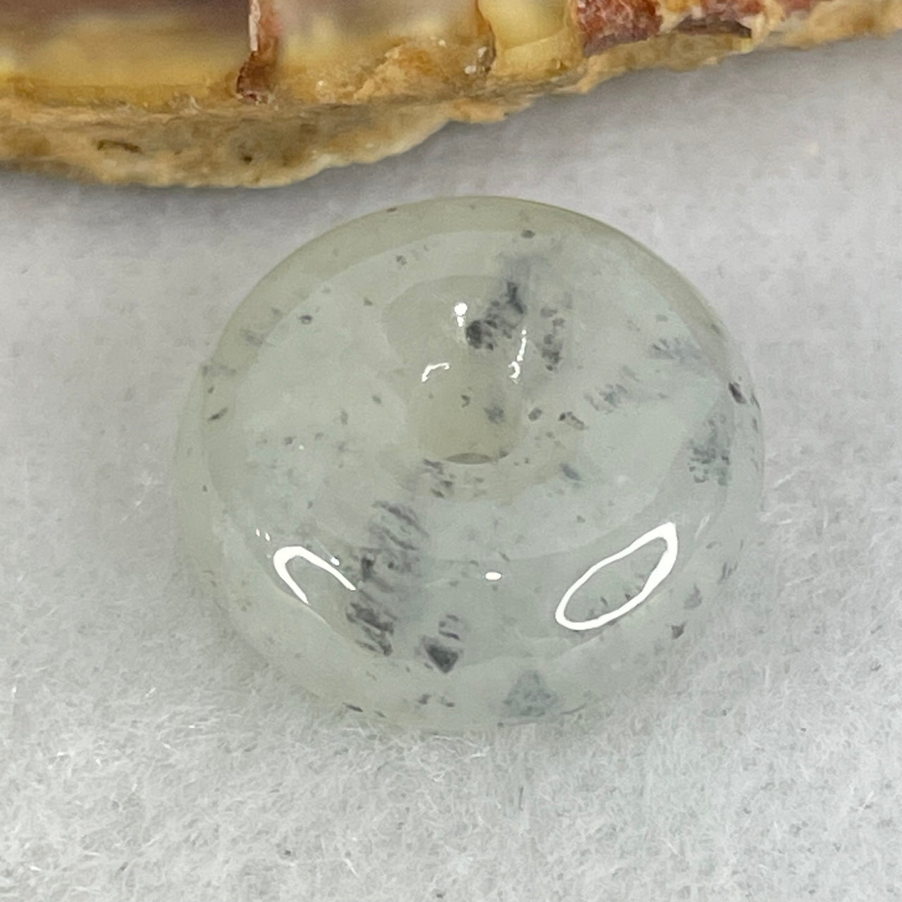 Type A Semi Icy Light Lavender with Grey Spots Jadeite Ping An Kou Charm/Pendant 3.12g 15.2 by 6.5mm - Huangs Jadeite and Jewelry Pte Ltd