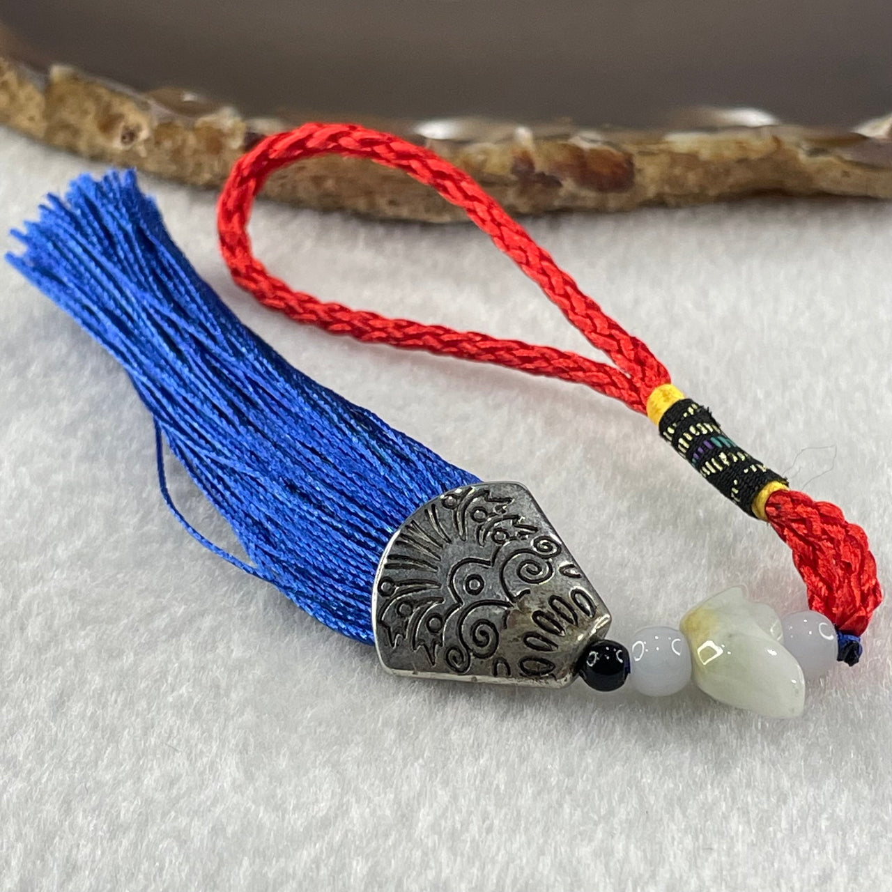 Type A Light Lavender Yellow Jadeite Yuan Bao Ingot in Red Blue String Display 4.75g 7.1 by 17.3 by 6.7mm - Huangs Jadeite and Jewelry Pte Ltd